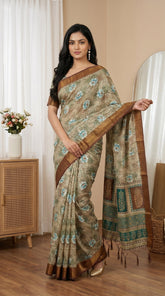 Beige & Aqua Blue Floral Tissue Saree with Zari Border and Tassel Pallu